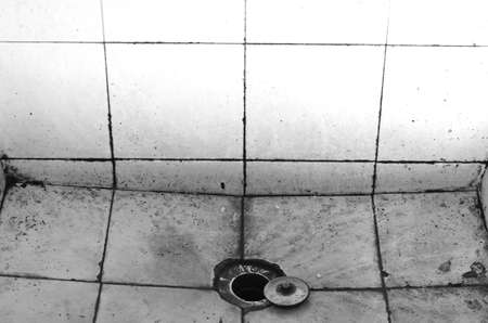 Dirty old sink in black and white themeの写真素材