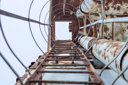 Rusty ladder on an abandoned building siteの写真素材