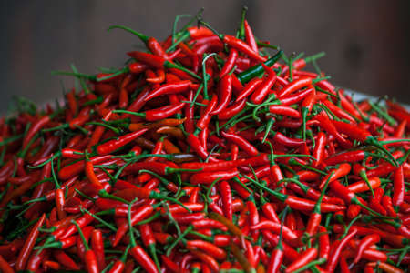 Fresh red Chili Pepper on the marketの写真素材