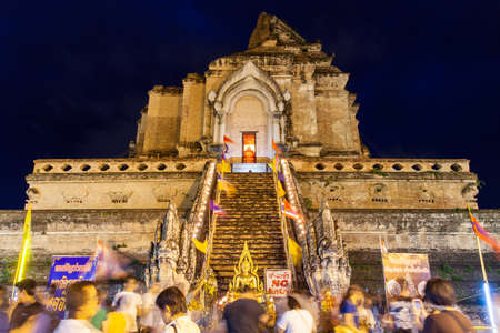 Crowd of people worshiping at Wat Chedi Luang during City Pillar Festival ( Inthakin Festival ) on 29 May 2014, Chiang Mai, Thailand.のeditorial素材