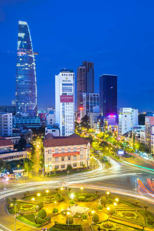 Ho Chi Minh City, Vietnam - November 21, 2015: View of the city after sunset with Bitexco Financial Tower on the background on November 21, 2015 in Ben Thanh Market area, District 1, Vietnam.のeditorial素材