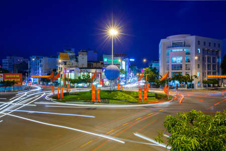 Nha Trang, Vietnam - December 23, 2015: Dusk view of the traffic circle in the center of Nha Trang city on December 23, 2015, Nha Trang, Vietnam.のeditorial素材
