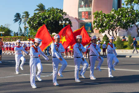 Nha Trang, Vietnam - May 31, 2016: Pioneer children march on the parade at the end of the school year in Nha Trang, Vietnam on May 31, 2016.のeditorial素材