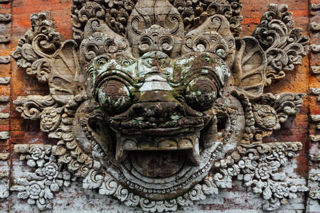 Barong bas-relief  on the wall of the royal palace, Ubud, Bali, Indonesiaの写真素材