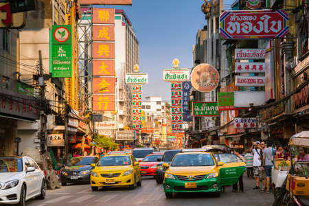Bangkok, Thailand - April 24, 2016: Car traffic at the Yaowarat road in Chinatown on April 24, 2016 in Bangkok, Thailand.のeditorial素材