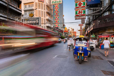 Bangkok, Thailand - April 24, 2016: Tuk-tuk taxi parked near street market in Chinatown on April 24, 2016 in Bangkok, Thailand.のeditorial素材