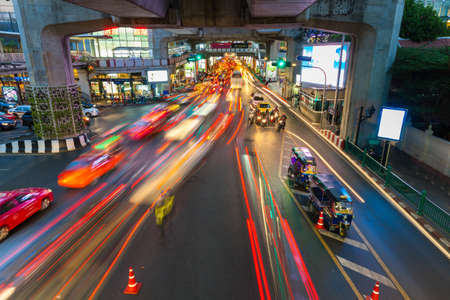 Bangkok, Thailand - April 22, 2016: Cars moving down the road in the heavy traffic conditions at Siam Square on April 22, 2016 in Bangkok, Thailand.のeditorial素材