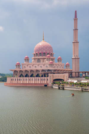 Beautiful pink Putra Mosque in the daylight, Putrajaya, Malaysiaの写真素材