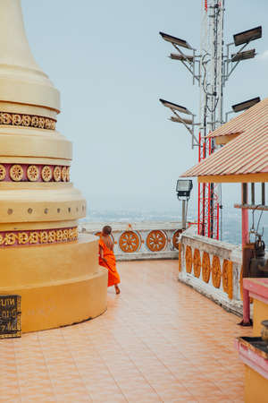 Krabi, Thailand - April 10, 2016: Novice monk observe the hilltop of the Tiger Cave Mountain Temple...