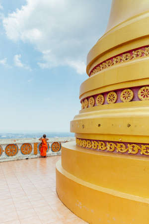Krabi, Thailand - April 10, 2016: Novice monk observe the hilltop of the Tiger Cave Mountain Temple...