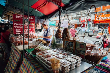 Bangkok, Thailand - September 11, 2016: Vendors sell food on the street on September 11, 2016 in...