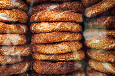 Stacks of simit bread at a street stall in Istanbul, Turkeyの写真素材