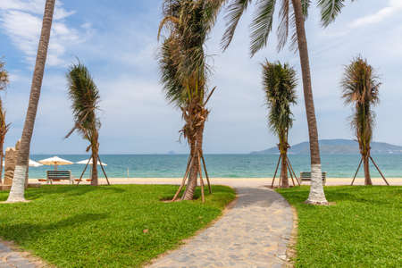 The Nha Trang Beach on a sunny day, the popular tourist destination in Vietnamの写真素材