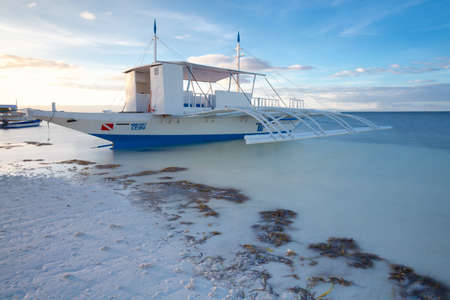 Traditional Filipino Bangka boats on the beach, Panglao, Philippinesのeditorial素材