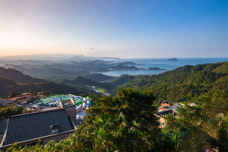 Beautiful sunset over the ocean coastline of Taiwan seen from Jiufen village, Taipei.のeditorial素材