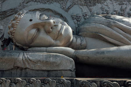 Close view of the reclining Buddha statue at the Long Son Pagoda, Nha Trang, Vietnamの写真素材
