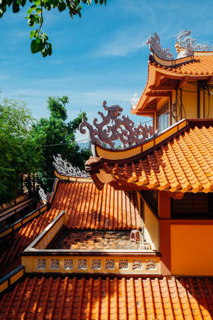 Close view of the Long Son Pagoda with dragon-form roof decorations, Nha Trang, Vietnamの写真素材
