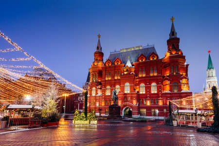 Moscow, Russia - December 15, 2019: The State Historical Museum with Christmas decorations on the foreground, Moscow, Russiaのeditorial素材