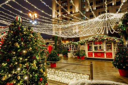 Moscow, Russia - December 15, 2019: Christmas Market at the Manezhnaya Square with The Moskva hotel on the background, Moscow, Russiaのeditorial素材