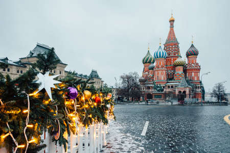 Christmas Market on the Red Square with Saint Basil's Cathedral on the background, Moscow, Russiaの写真素材