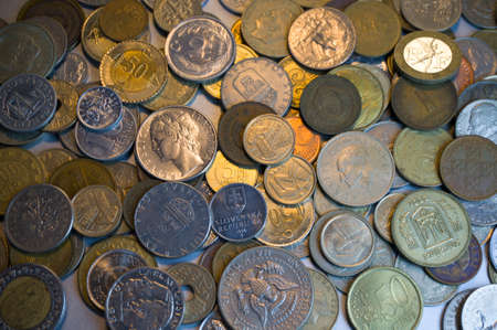 Collection of different coins background. Overhead Close up.の写真素材