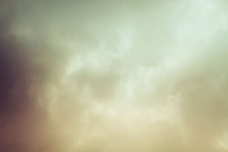 Cloud vintage Texture with brown, golden and orange tintの写真素材