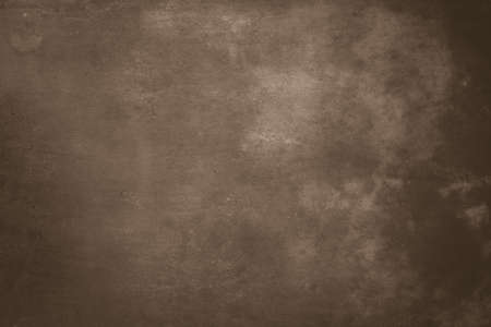 Brownish brushed and worn metal plate textureの写真素材