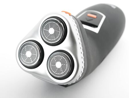 Electric shaver on white. の写真素材