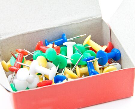 Colorful pins in a box. 