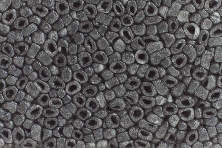 Textured dark plastic background, closeup の写真素材