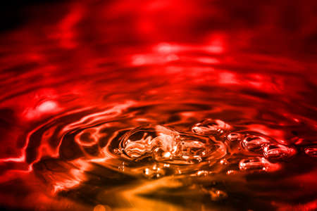 Water drop with circle on water surface.の写真素材