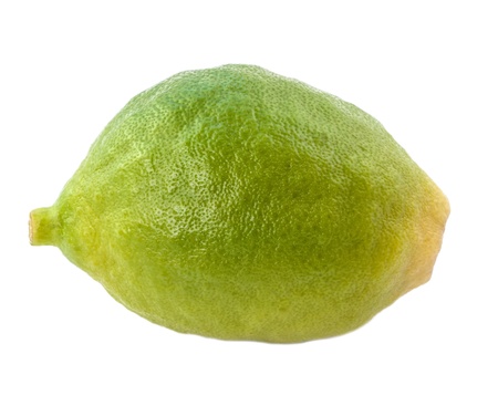 Green unripe lemon isolated on white.の写真素材