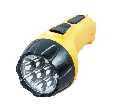 Yellow electric pocket flashlight isolated on white   の写真素材