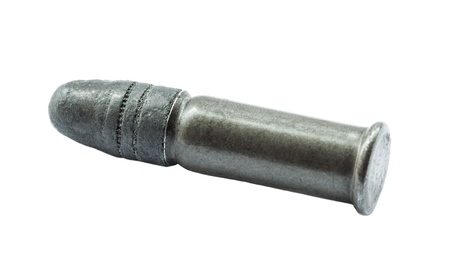 One bullet on the white background, super macro 