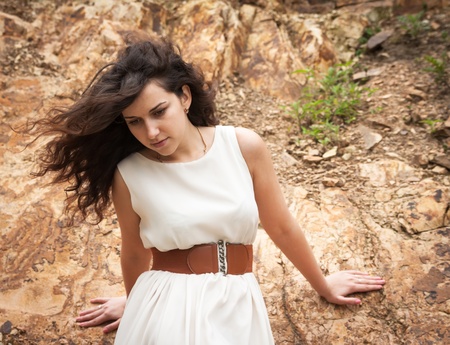 Portrait of a beautiful woman in white dress  の写真素材