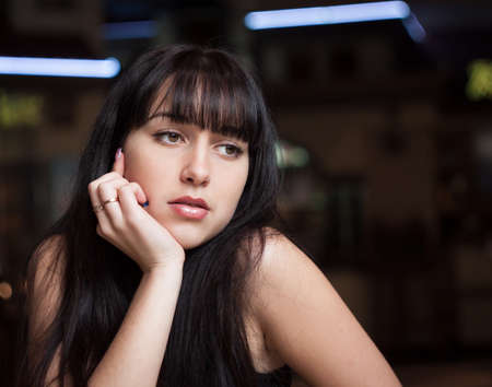 Young beautiful brunette woman  Close-up portrait 