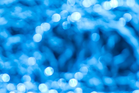  Abstract circular blue bokeh background  の写真素材
