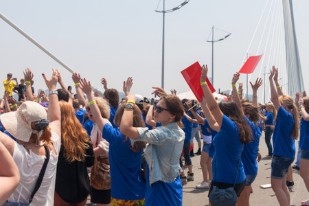 VLADIVOSTOK, RUSSIA - JULY 7: dance Flash mob on the "Golden Bridge". It was attended by hundred people who danced on   the "Golden Bridge" on July 7, 2013 in Vladivostok, Russia. のeditorial素材