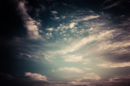   Surreal, dark cloudy sky  Color toned image  