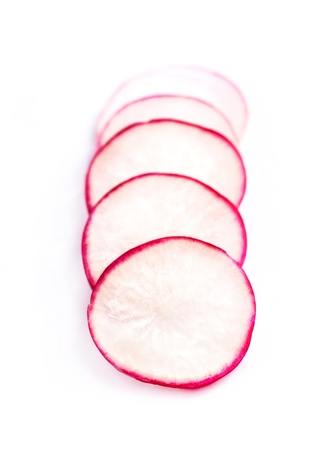 Radish slices on white background  Shallow depth of field  Selective focus の写真素材