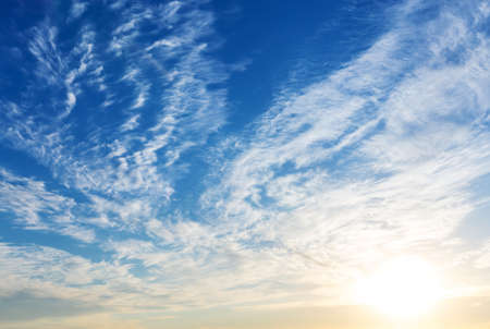   Blue sky with sun and clouds 