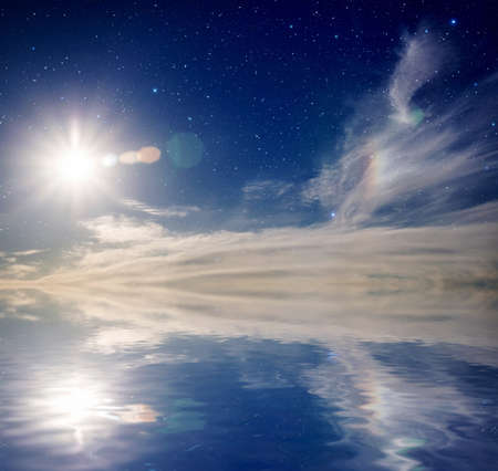  Blue sky with sun and stars  With lens flare effect  の写真素材