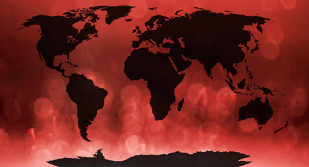 World map continents in red bokeh background  の写真素材