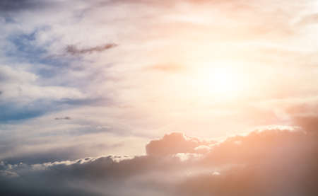 Dramatic sunset sky with clouds and sun  