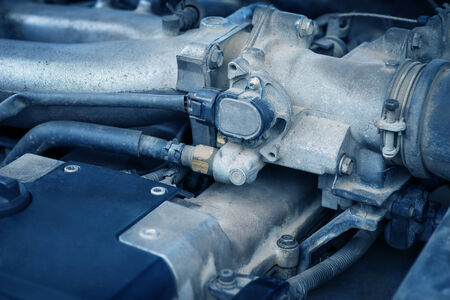  Old and dirty car engine, detail view  Selective focus  Color toned image 