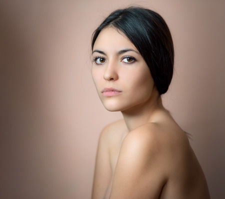 Portrait of a beautiful young brunette. Selective soft focus.の写真素材