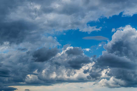 Blue sky with clouds as background.
