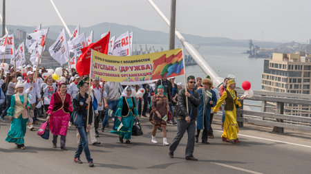 VLADIVOSTOK, RUSSIA - MAY 1, 2015: Citizens and representatives of various organizations take part in May day parade to celebrate the international Workers\' Day.のeditorial素材