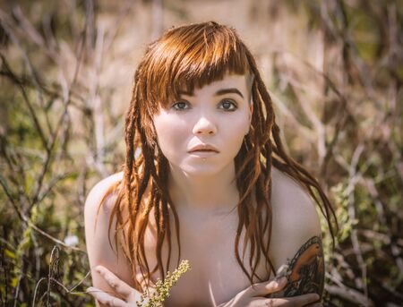 Image of beautiful redhead woman. Selective focus with shallow depth of field.の写真素材