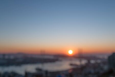 Blurred city view during sunset.の写真素材
